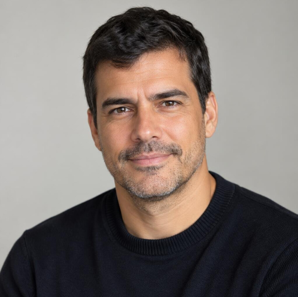 Portrait of a Brazilian man with short hair and a calm expression